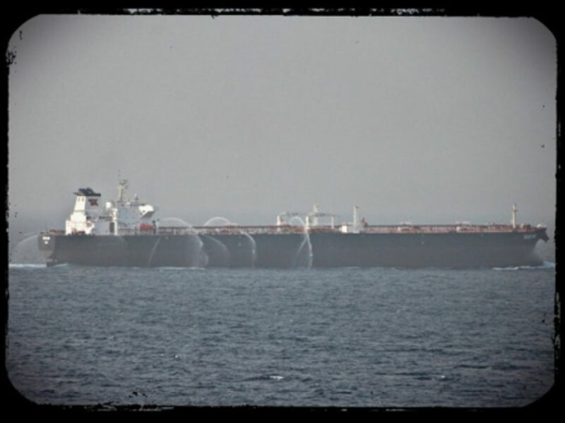 A tanker in the Gulf of Aden uses fire hoses to keep pirates away.
