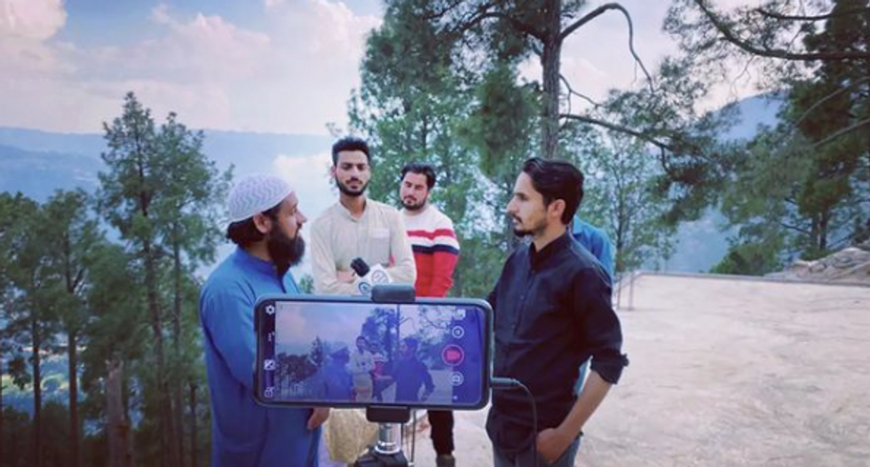A team member of 'The Chenab Times' reporting on developmental issues in the Chenab valley, India​
