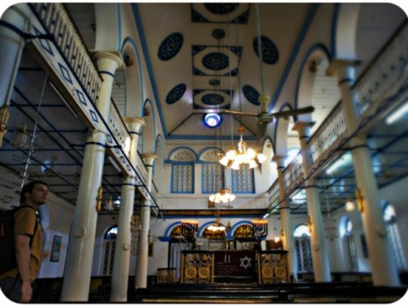 A tourist inside Yangon's Musmeah Yeshua, the last surviving synagogue in Myanmar