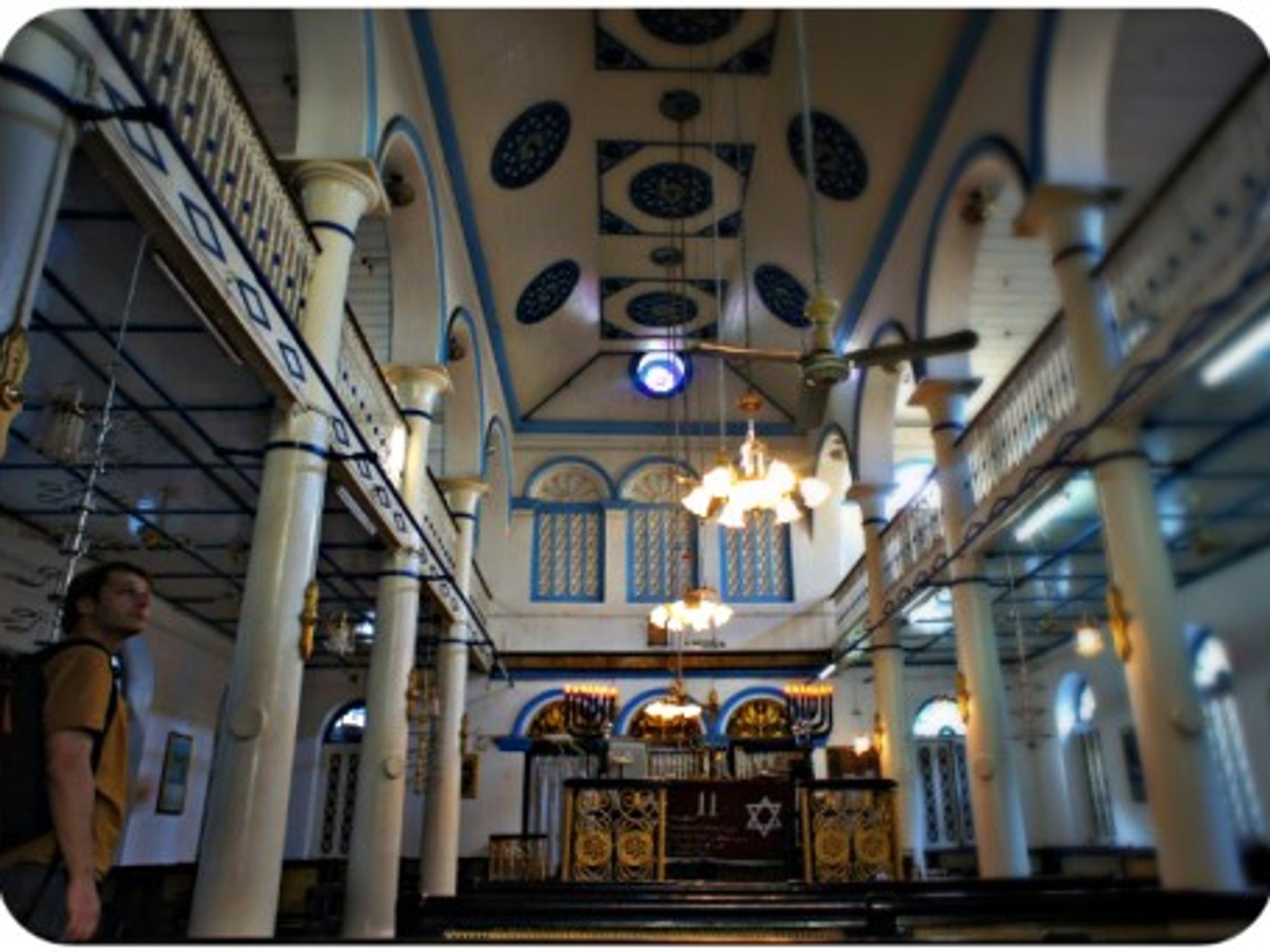 A tourist inside Yangon's Musmeah Yeshua, the last surviving synagogue in Myanmar