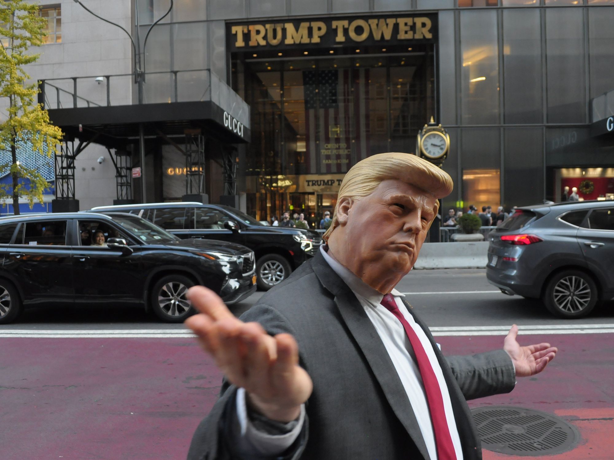 A Trump impersonator poses on the street outside of Trump Tower in Manhattan, New York City.
