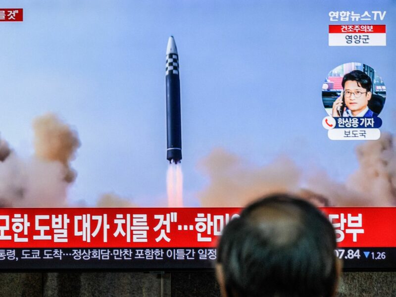 A tv screen shows a file footage of North Korea's long-range ballistic missile launch during a news program at Yongsanl railway station.​