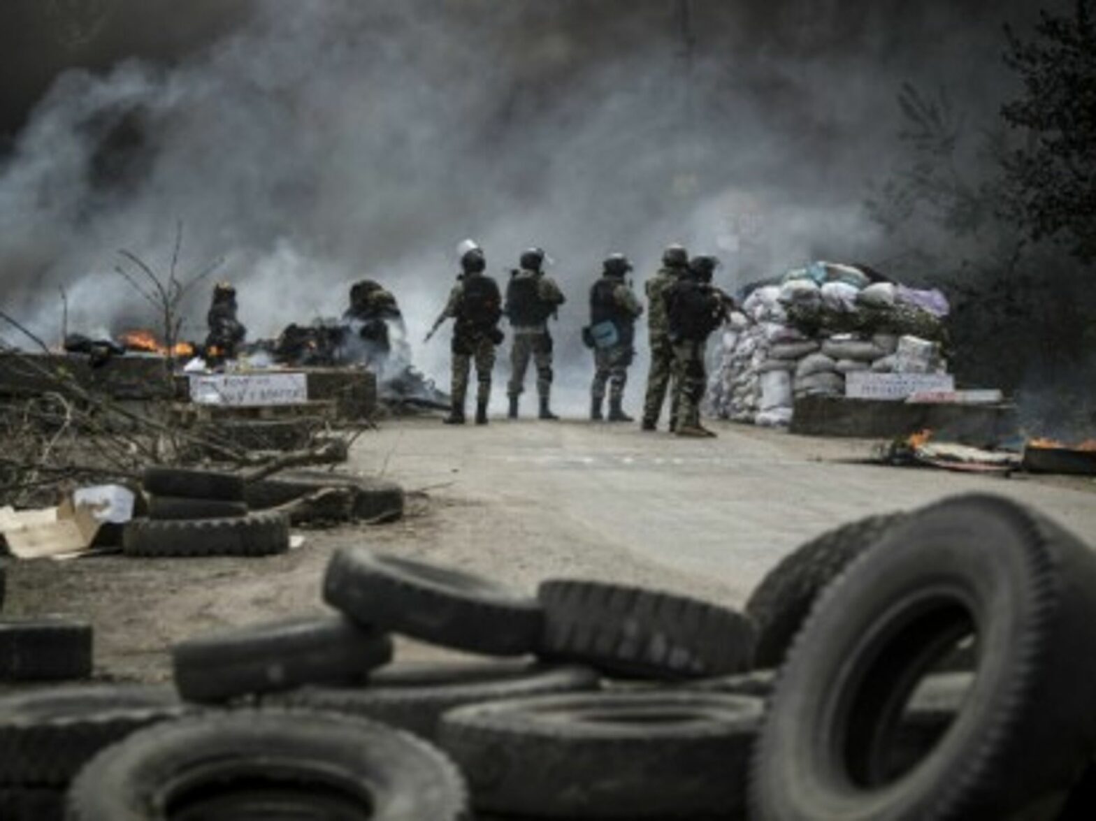 A Ukrainian commando moves on separatist barricades in Sloviansk, eastern Ukraine.