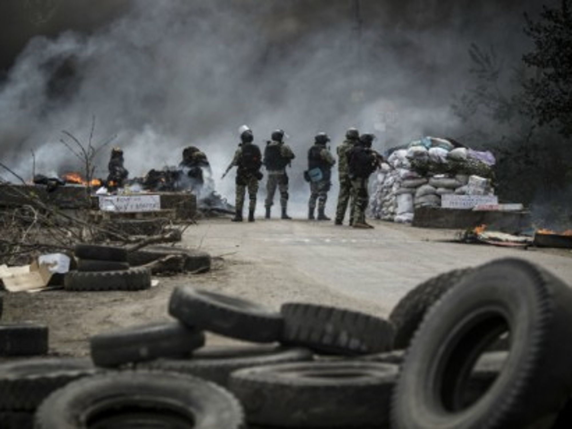 A Ukrainian commando moves on separatist barricades in Sloviansk, eastern Ukraine.