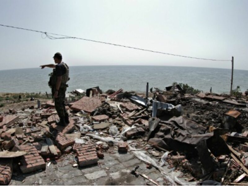 A Ukrainian soldier checks a site destroyed by Russian forces on Aug. 7.