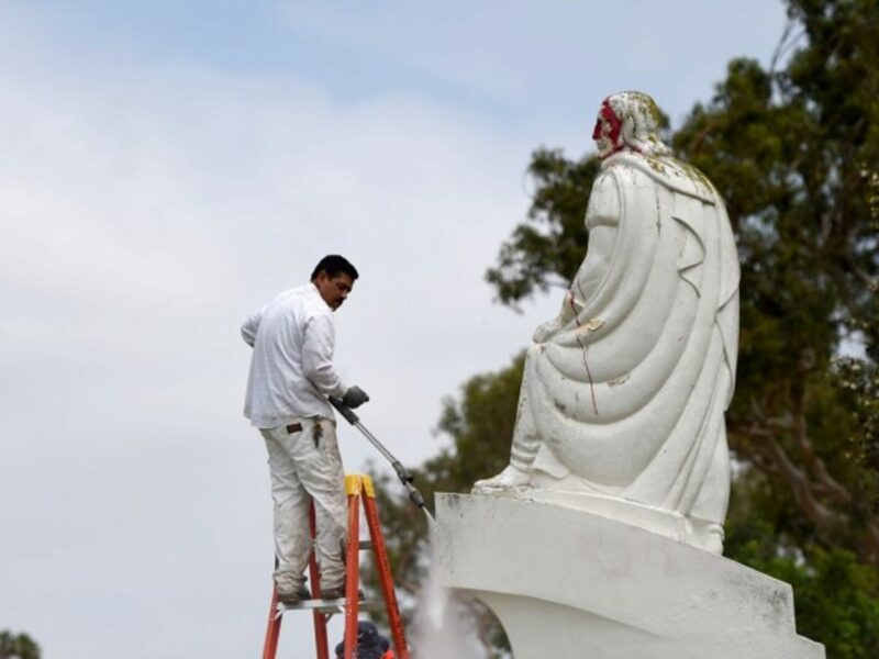 A vandalized Juan Rodriguez Cabrillo statue in San Pedro, California, is cleaned