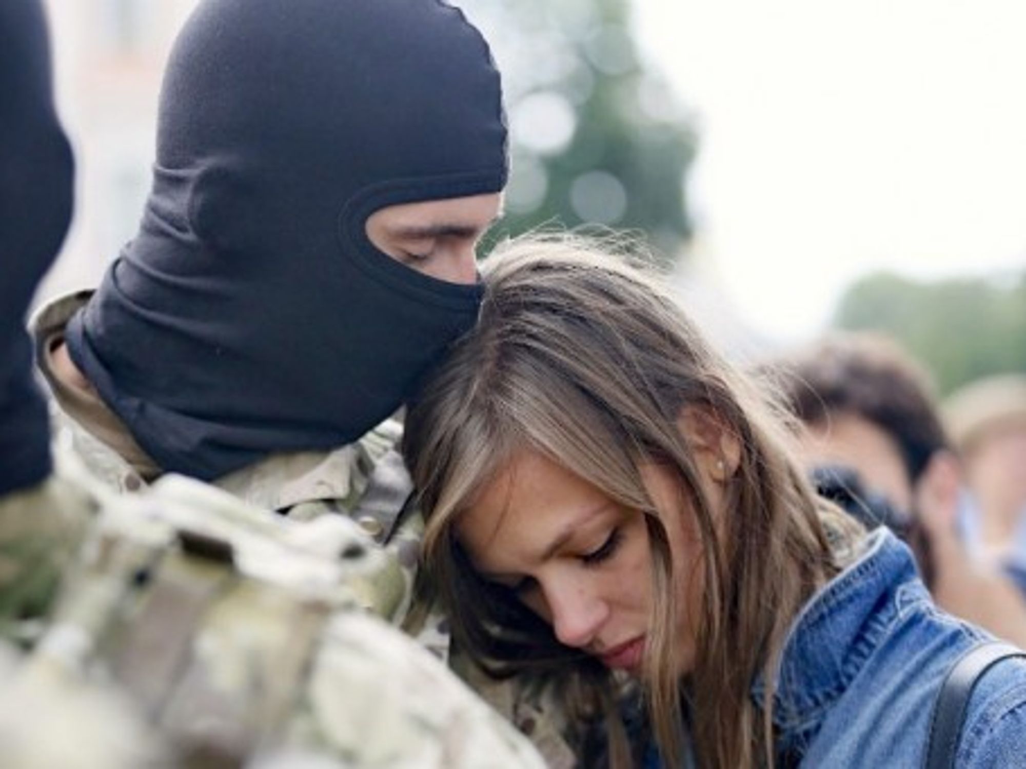 A volunteer in Kiev says goodbye to his loved one before being sent to eastern Ukraine to join the ranks of special battalion Azov.