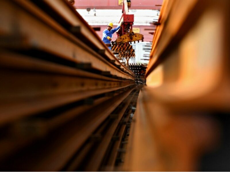 A welder prepares steel rails in Zhengzhou in 2017.