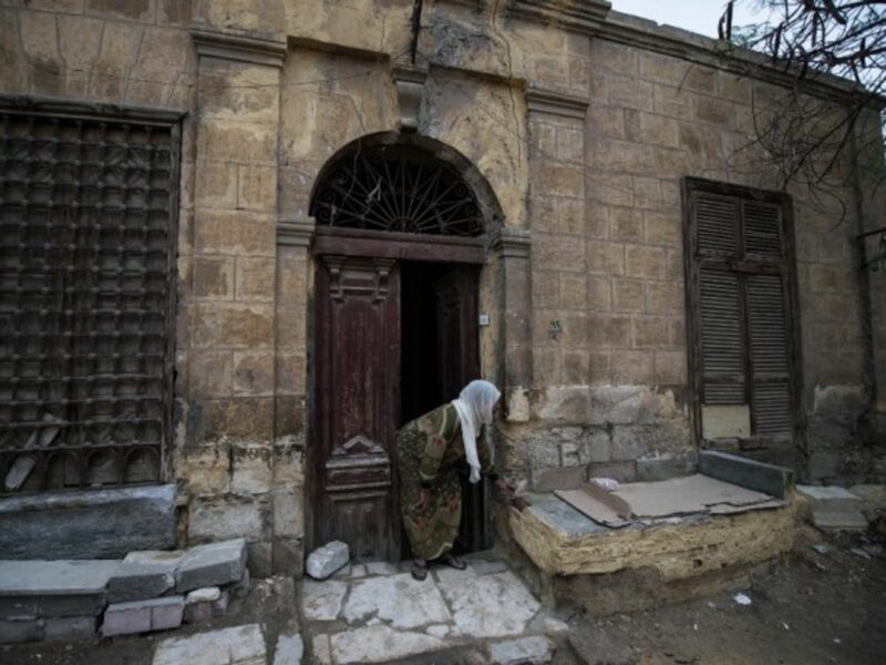 A woman at the family's tomb in Cairo's City of the Dead