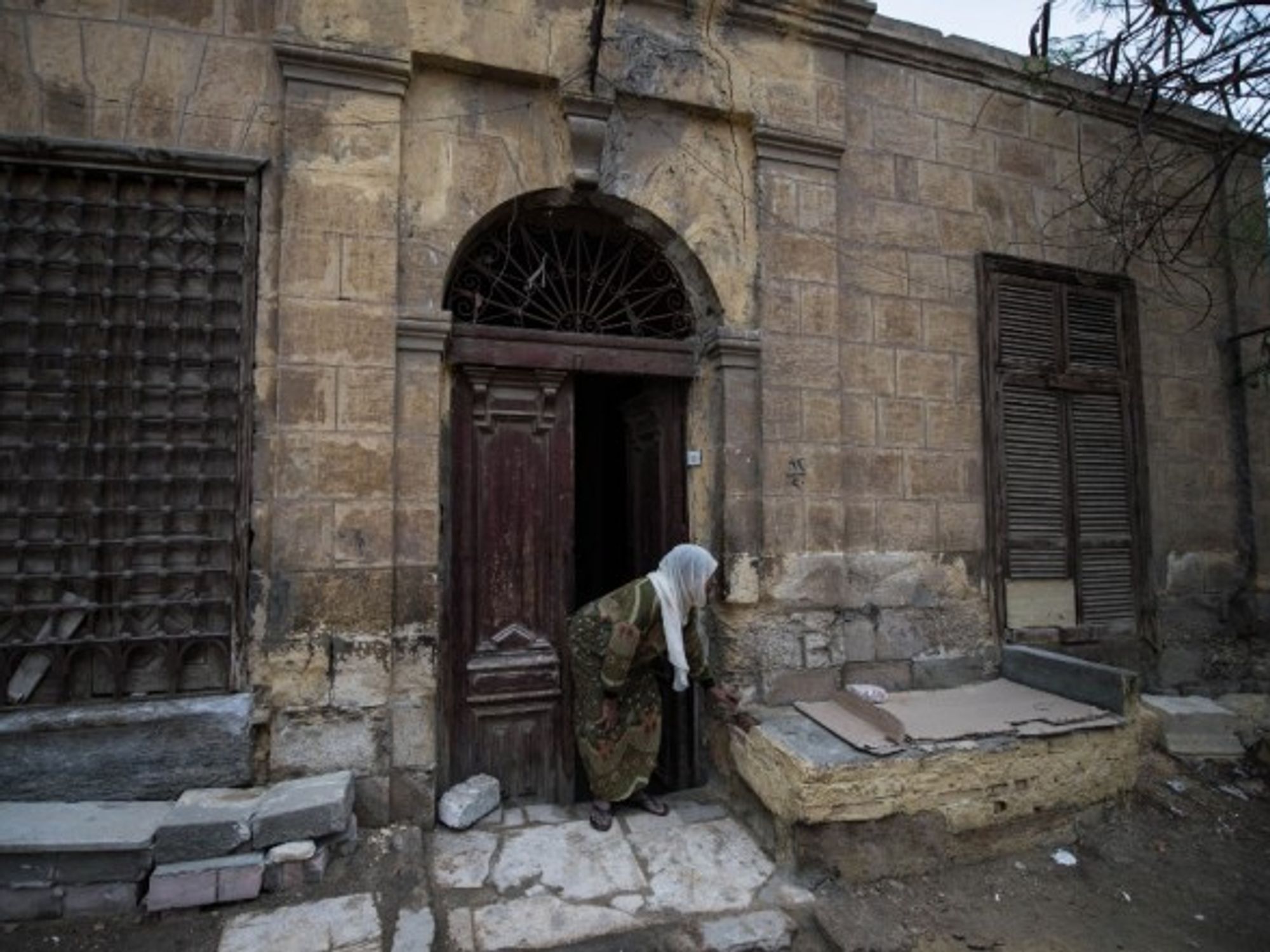 A woman at the family's tomb in Cairo's City of the Dead
