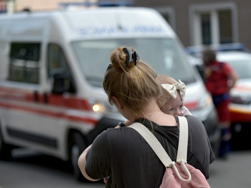 A woman holds a baby at the Ohmatdyt National Specialized Children's Hospital attacked by Russia's Kh-101 strategic cruise missile, Kyiv, capital of Ukraine