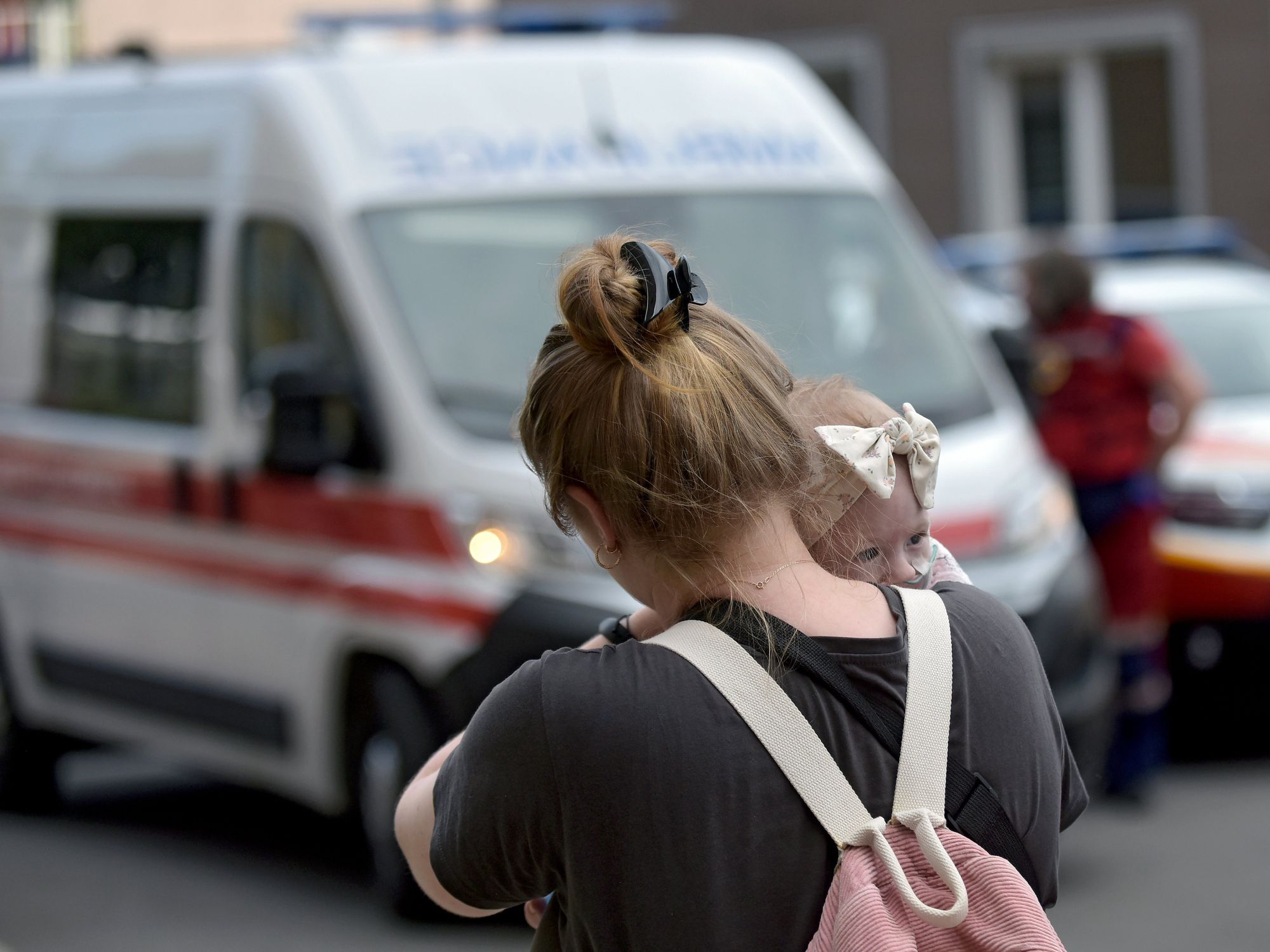 A woman holds a baby at the Ohmatdyt National Specialized Children's Hospital attacked by Russia's Kh-101 strategic cruise missile, Kyiv, capital of Ukraine