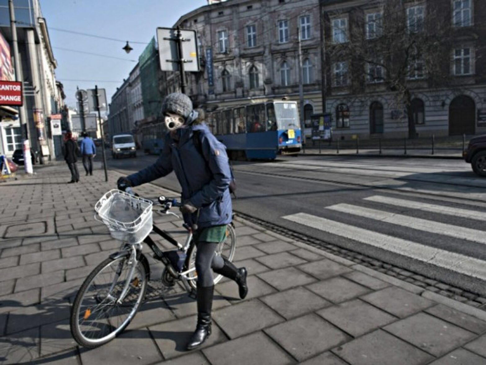 A woman wears a mask in Krakow earlier this month