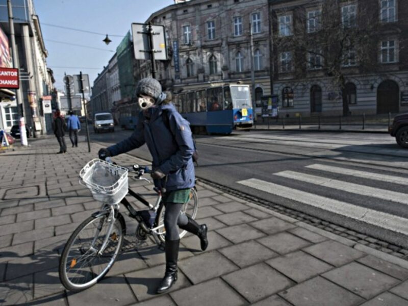 A woman wears a mask in Krakow earlier this month