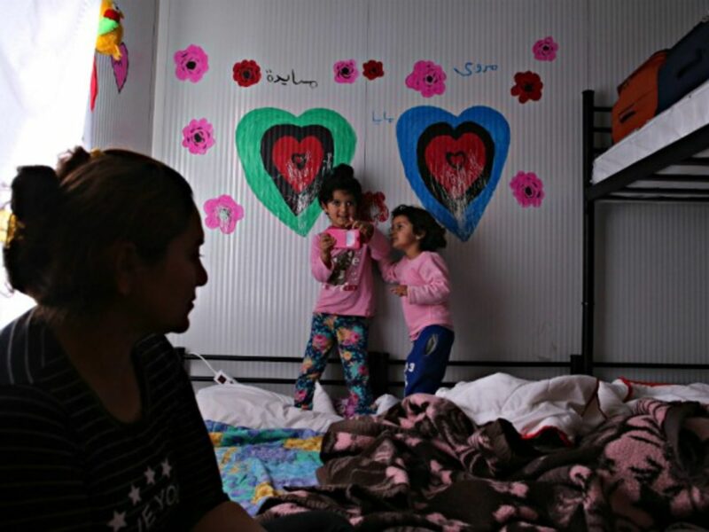 A Yazidi mother and her daughters in a refugee camp in Greece