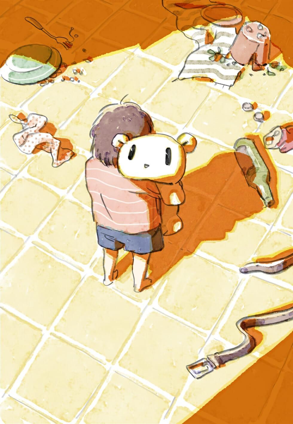 a young boy hugging his teddy bear