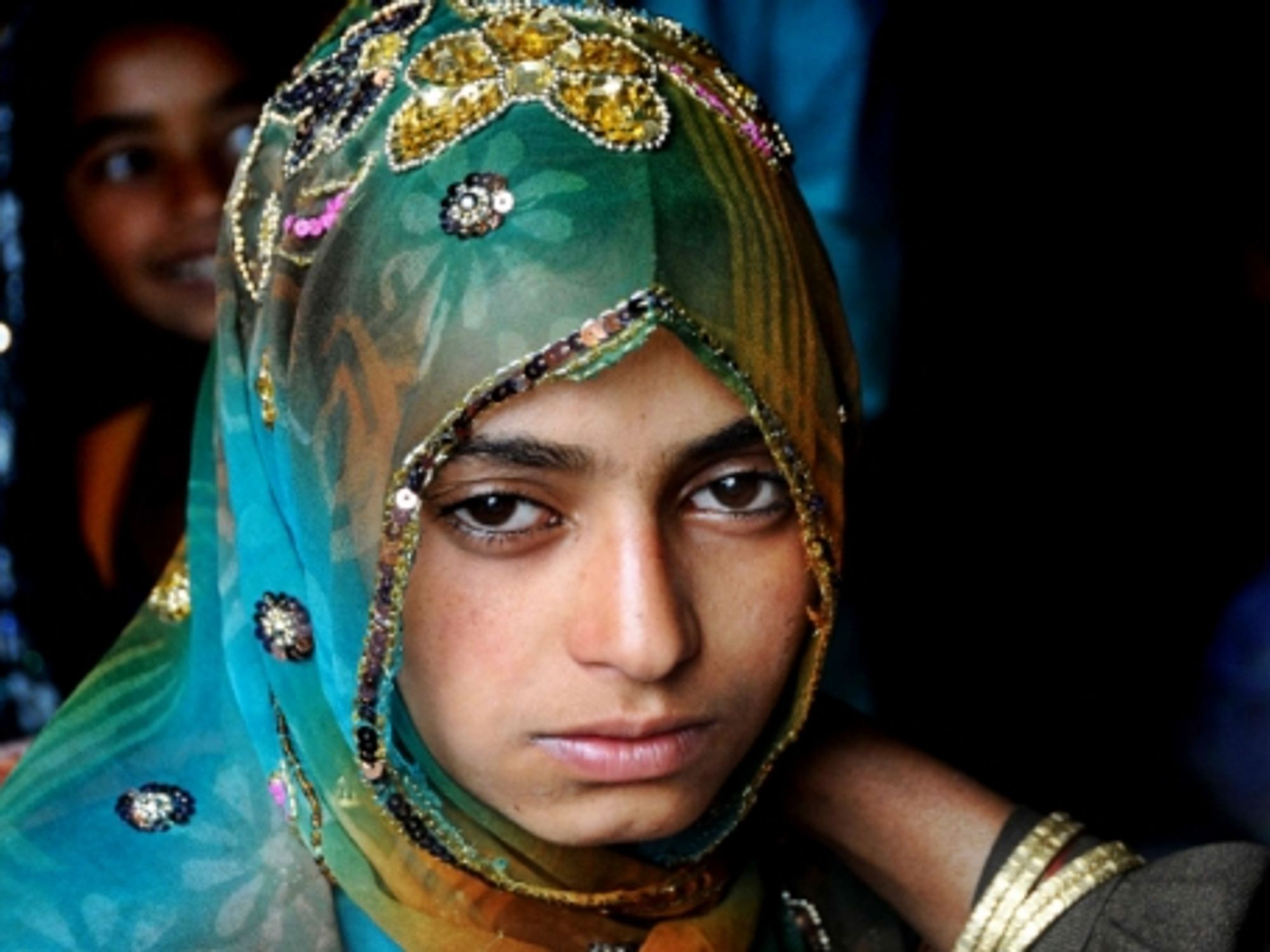 A young bride waits for her bridegroom.
