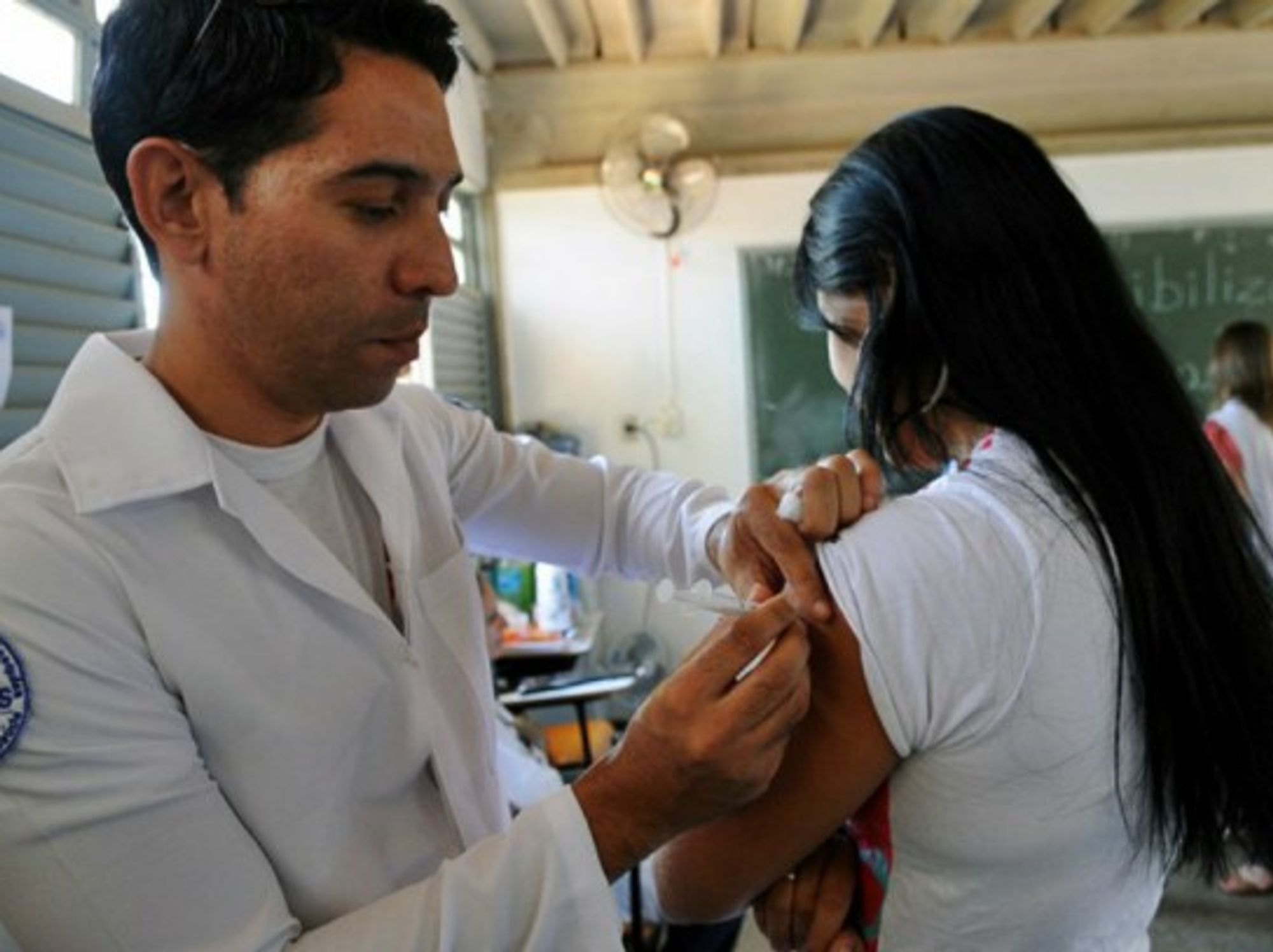 A young girl gets vaccinated against yellow fever in Brazil