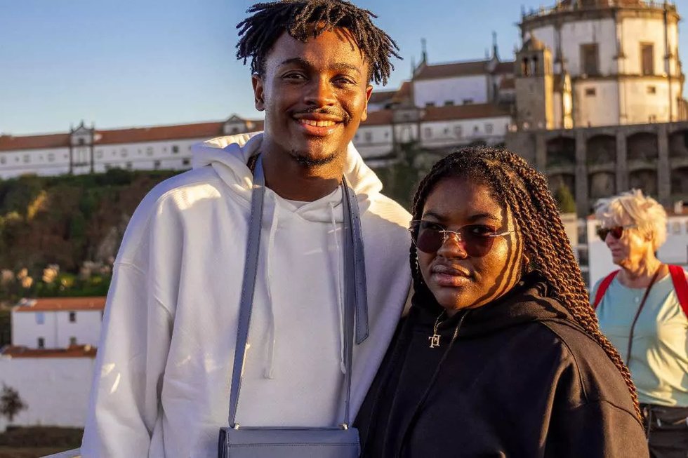 A young man and woman photographed in Portugal, November 2024