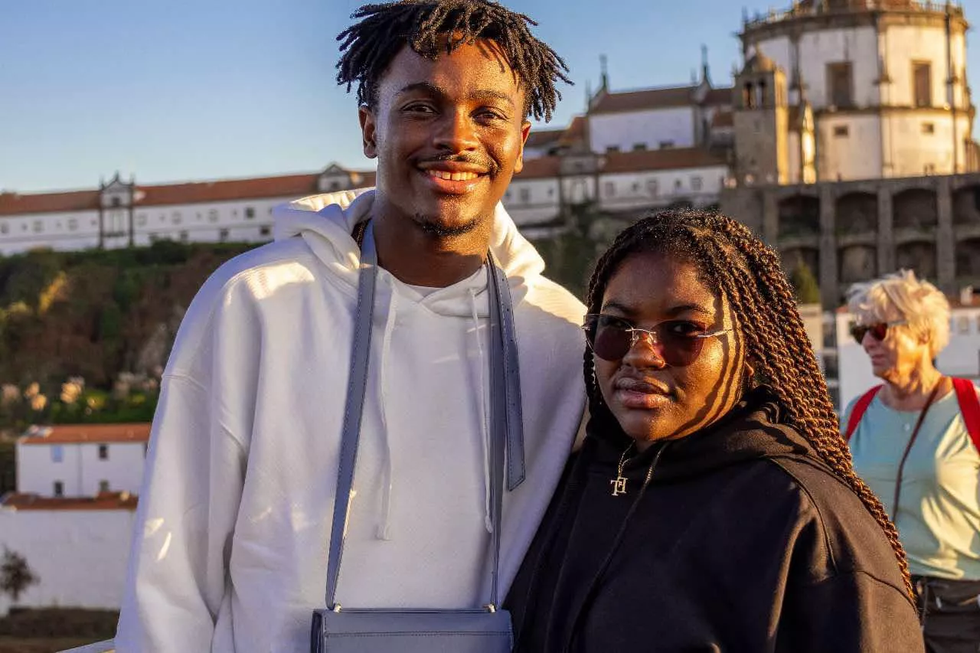 A young man and woman photographed in Portugal, November 2024