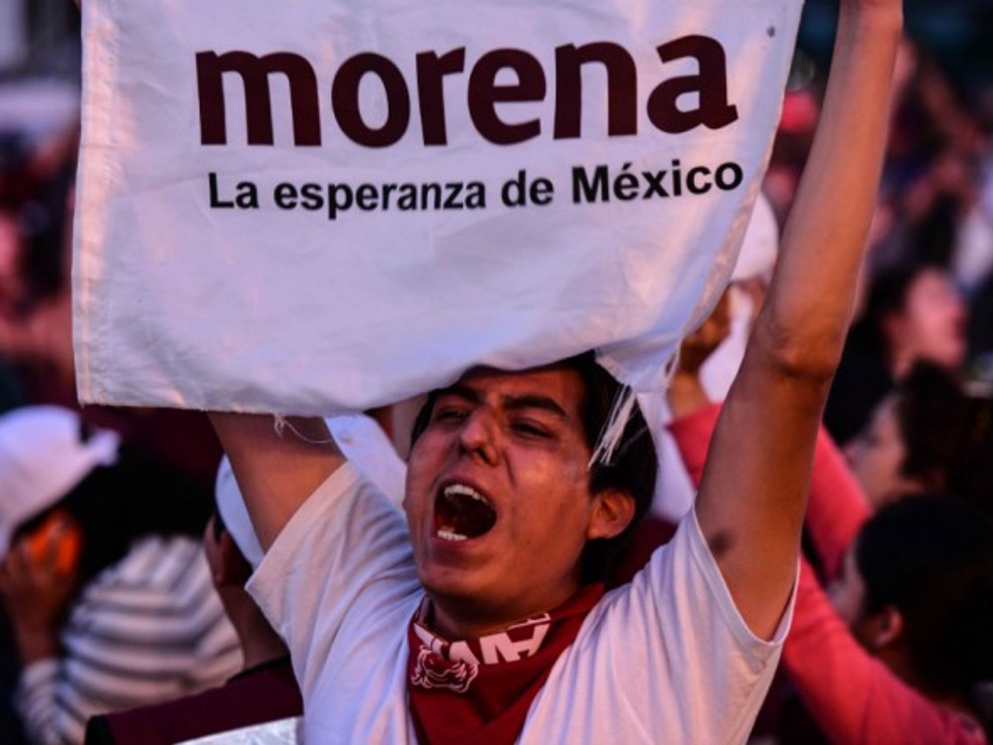 A young man cheers to presidential candidate Manuel Lopez Obrador at a rally in Mexico on June 27