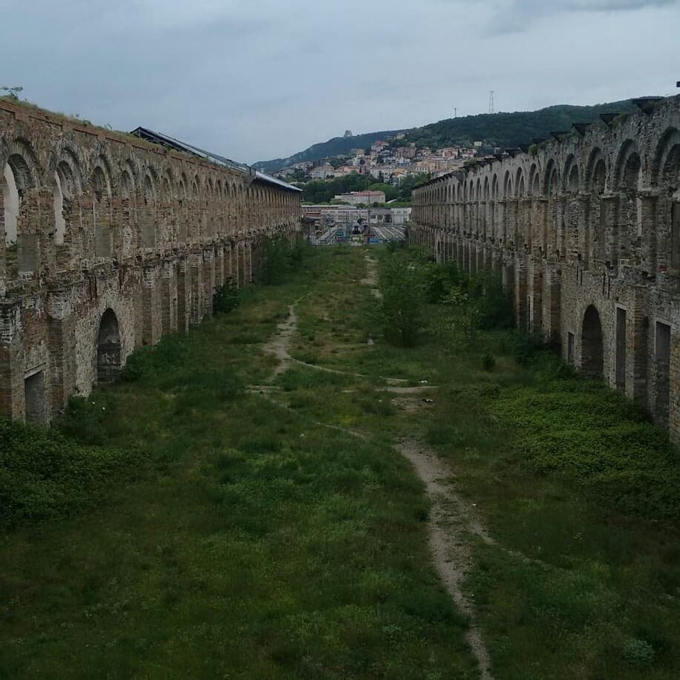 Abandoned Silos building in Trieste, northern Italy, now acting as a temporary, impromptu shelter for asylum seekers.