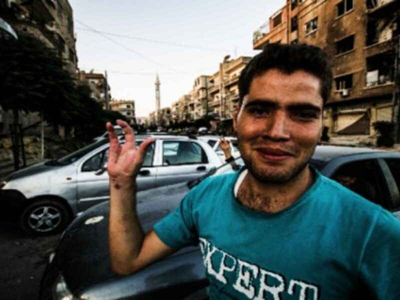 Abu Ali, an Free Syrian Army fighter, lost two of his middle fingers when he fired with an explosive bullet