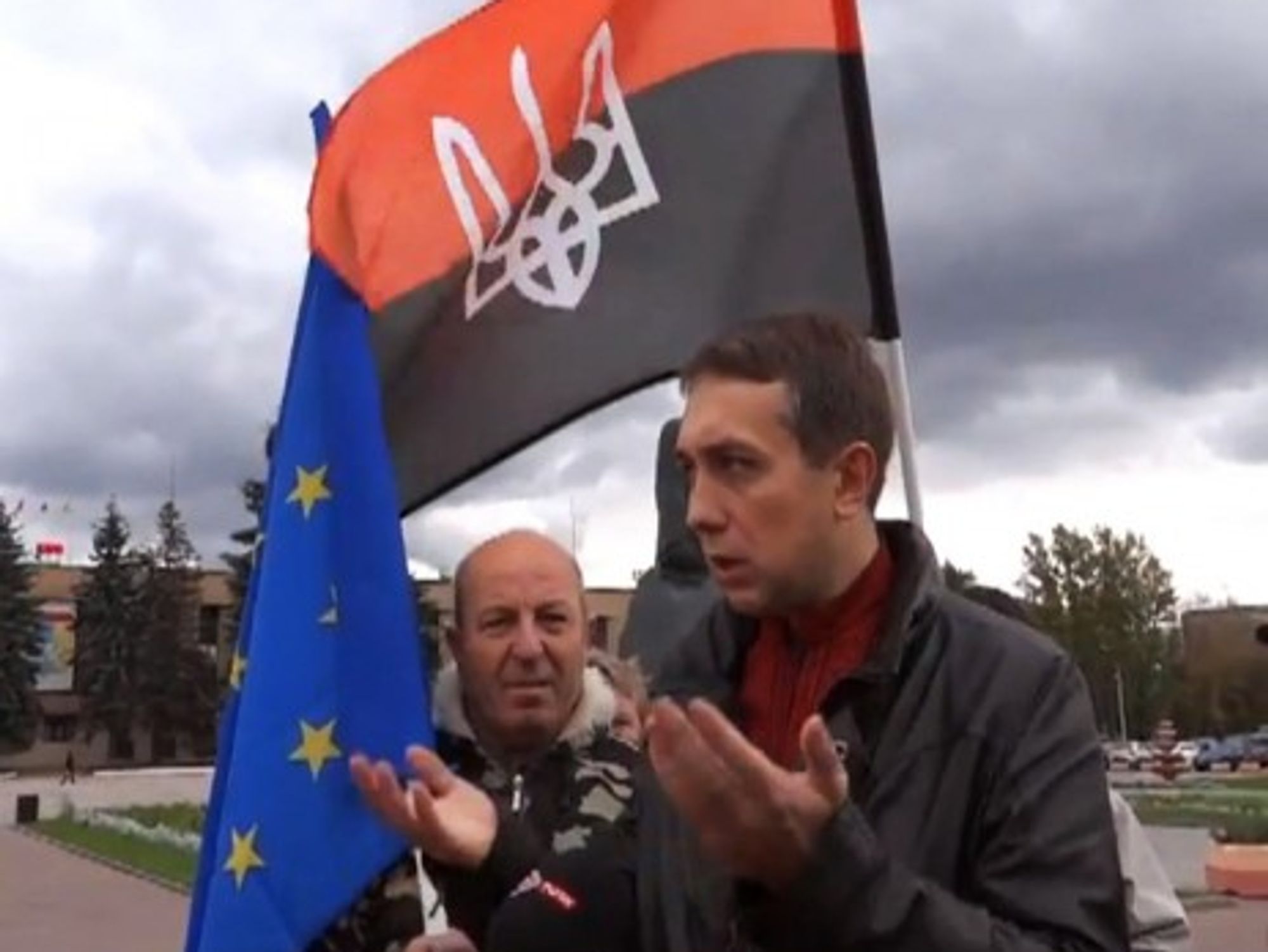 Activist Evgenii Arkhipov before the Russian Democratic Republic of Domodedovo flag