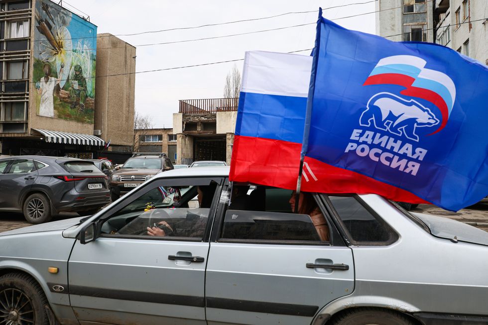 Activists head for Teatralnaya Square in Lugansk to start Za Putina, a motor rally in support of Russian President Putin.