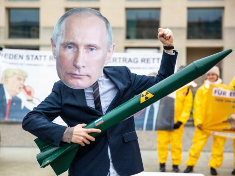 Activists wear masks to look like Russian President Vladimir Putin during a protest for the INF treaty in Germany, in 2019.
