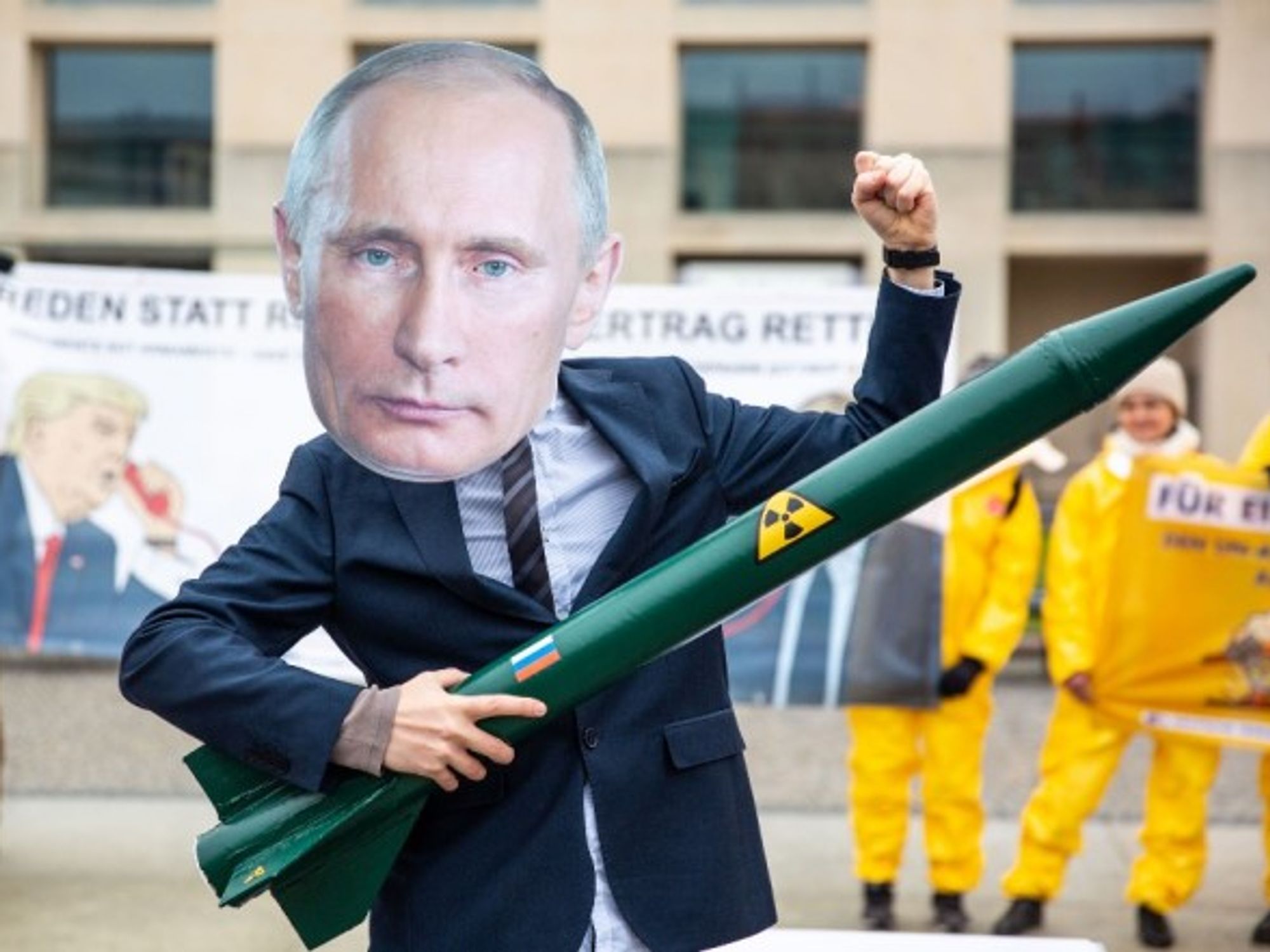 Activists wear masks to look like Russian President Vladimir Putin during a protest for the INF treaty in Germany, in 2019.