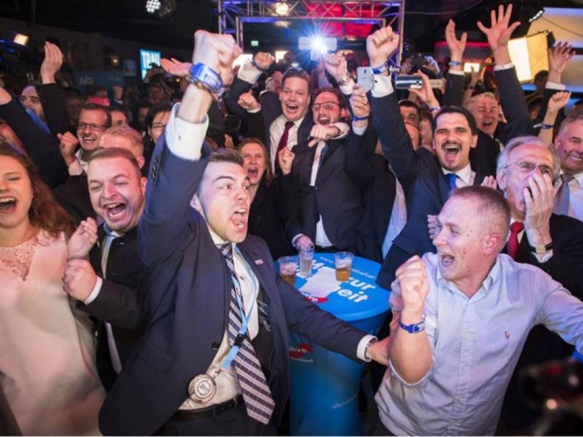 AfD supporters react to election results in Berlin on Sept. 24