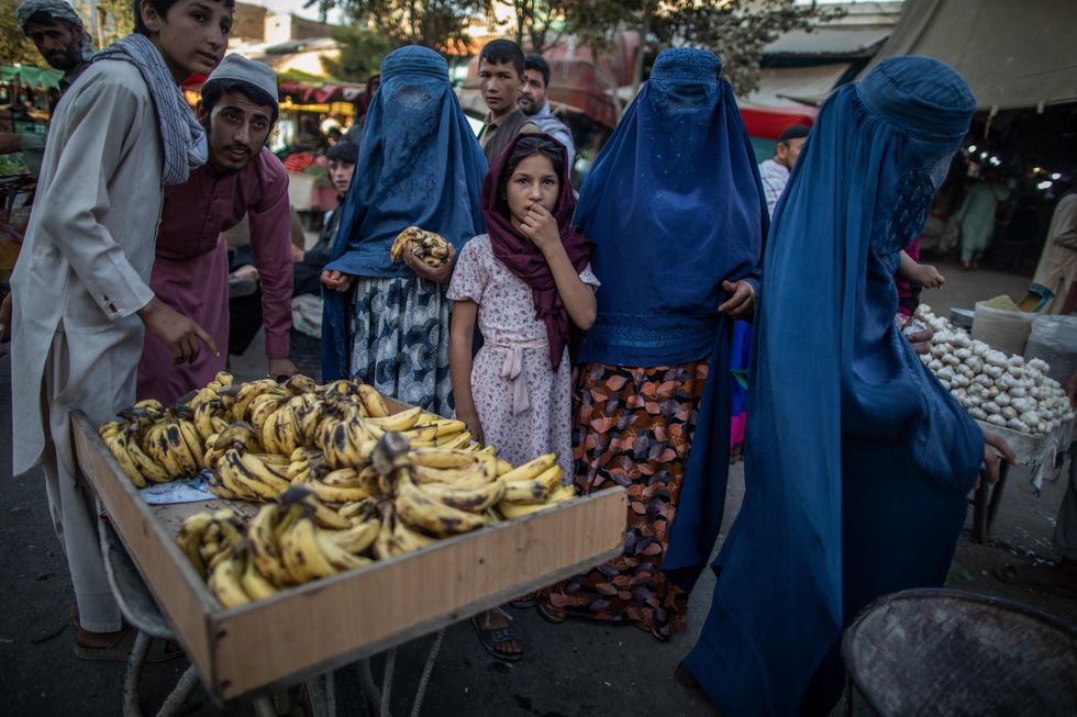 Afghani women shopping at a market in northern Afghanistan.