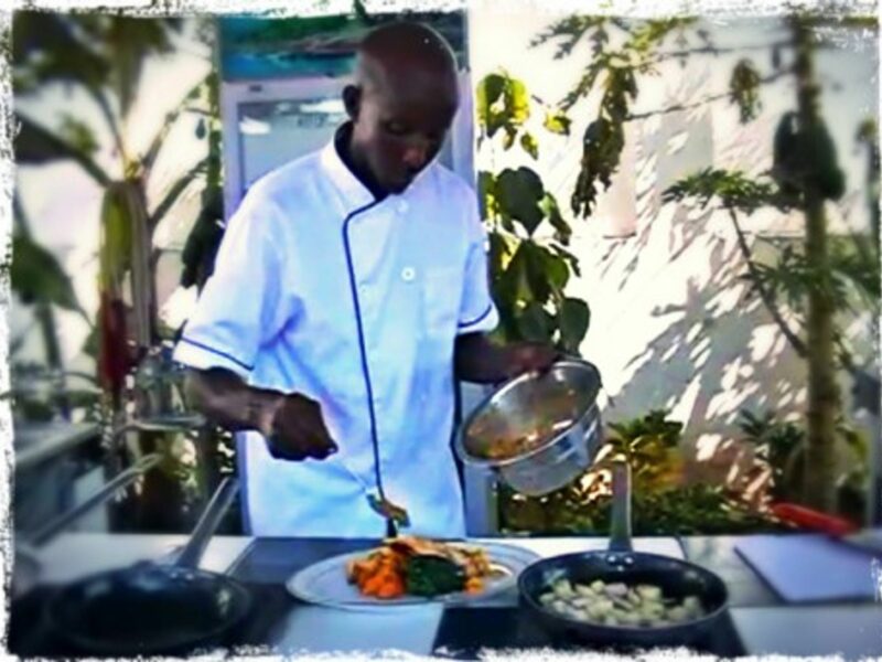 Ahmed Jama working at Mogadishu's The Village restaurant