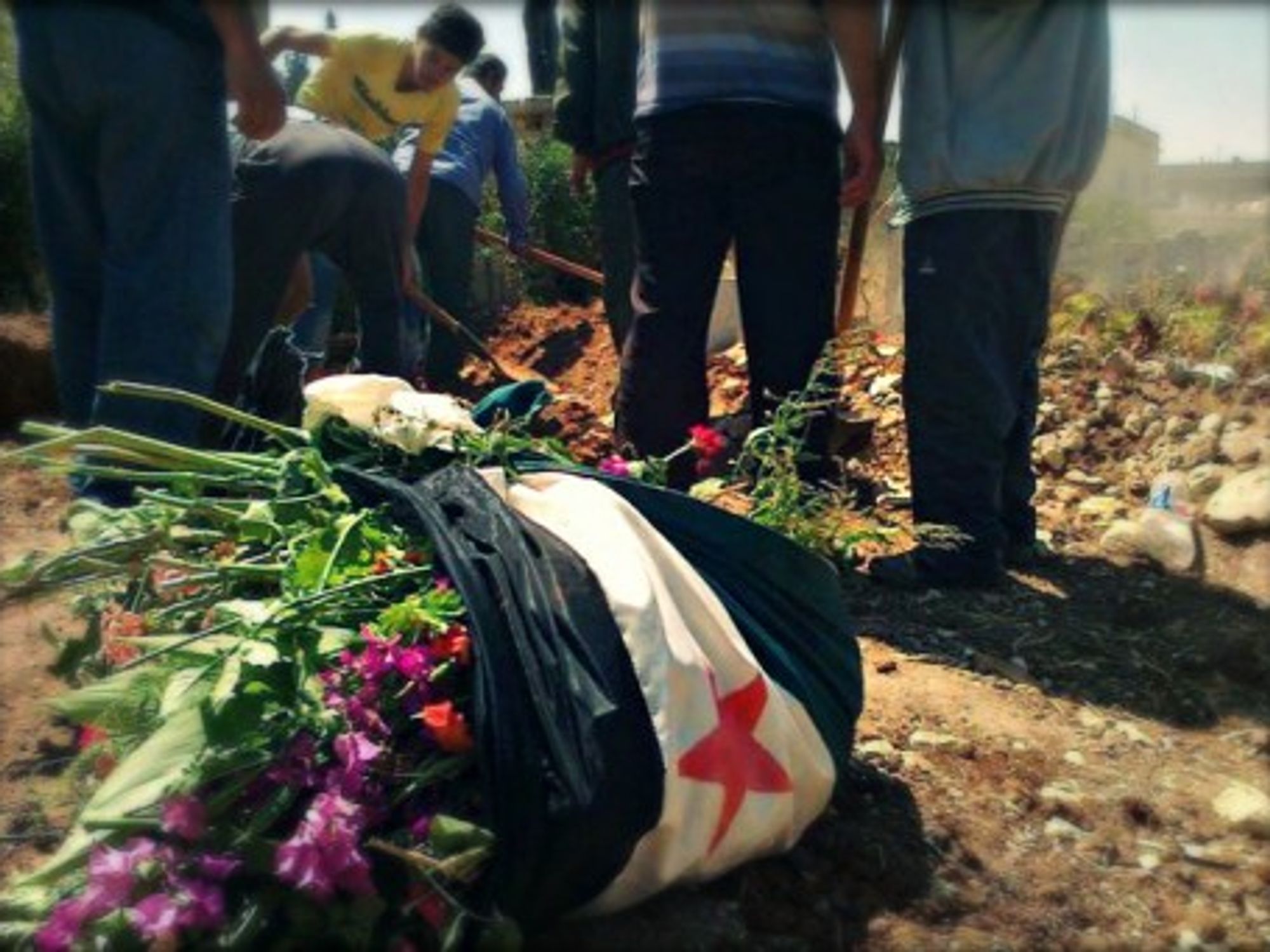 Al-Qusayr makeshift cemetery in Homs