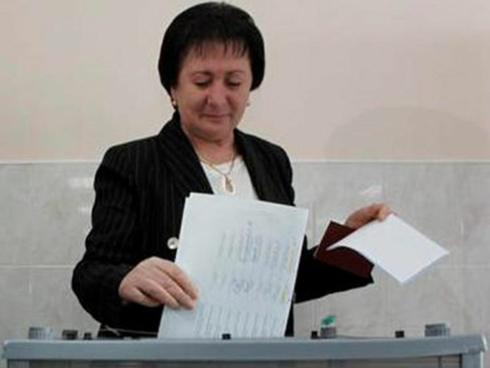 Alla Dzhioyeva casting her ballot during the first round of elections.