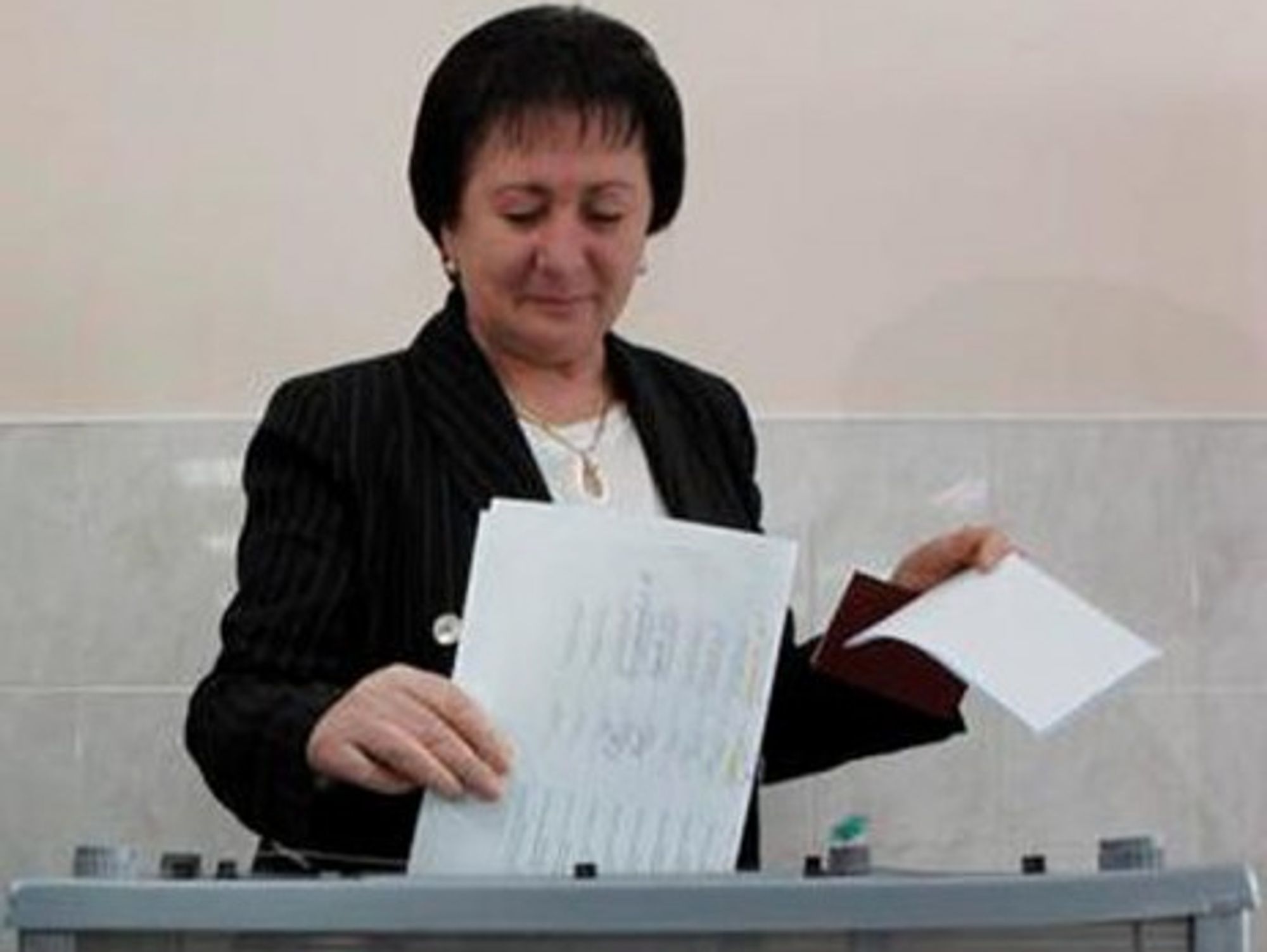Alla Dzhioyeva casting her ballot during the first round of elections.
