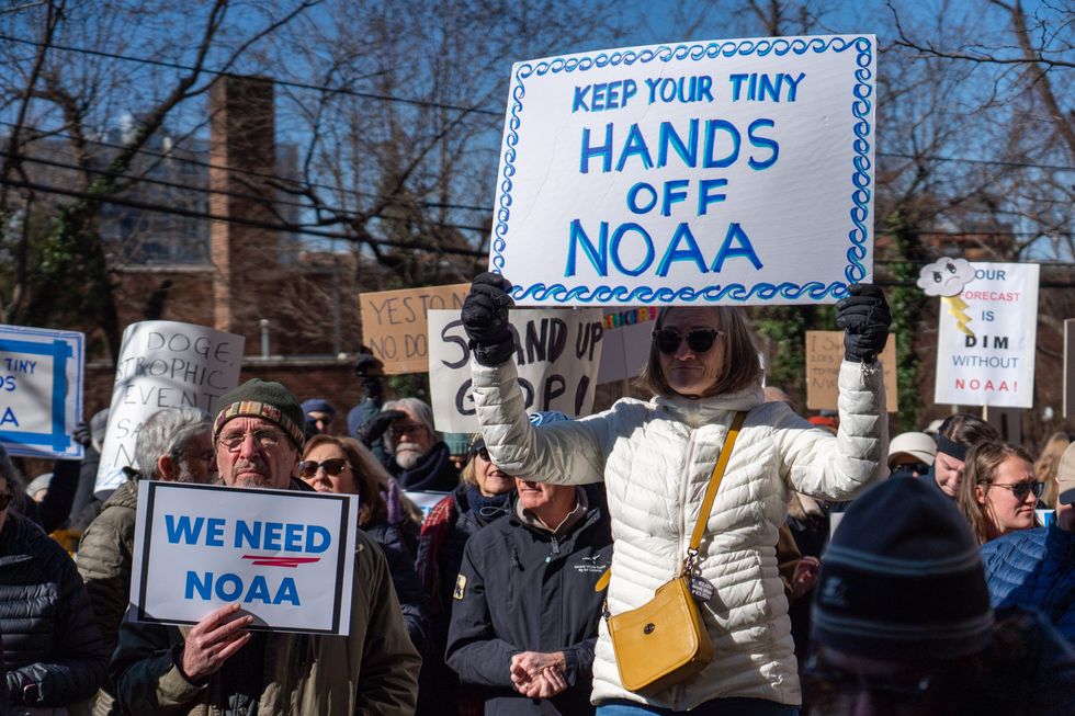 Americans protesting outside the headquarters of the National Oceanic and Atmospheric Administration
