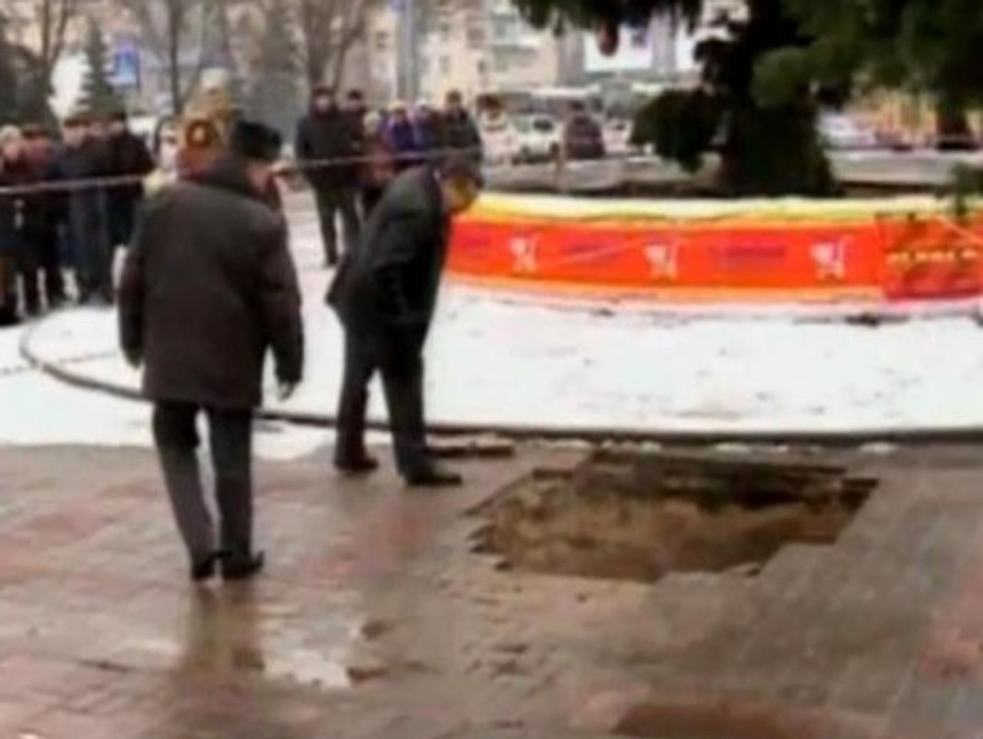 An 18-month-old baby died after he was sucked into this sewer hole with his mother.