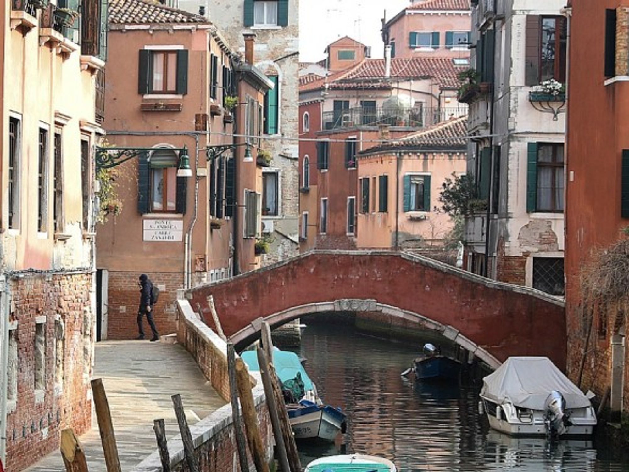 An almost empty canal street in Venice on Feb. 24