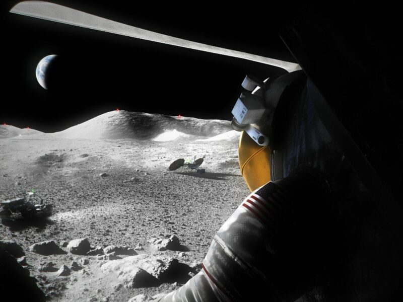An artist's concept of a Artemis astronaut looking out across the lunar surface.