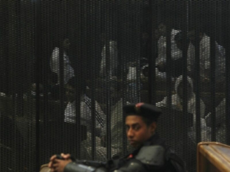 An Egyptian guard at a recent trial in Cairo.