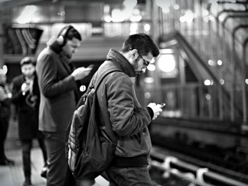 An idle moment waiting for the train resolved with phones