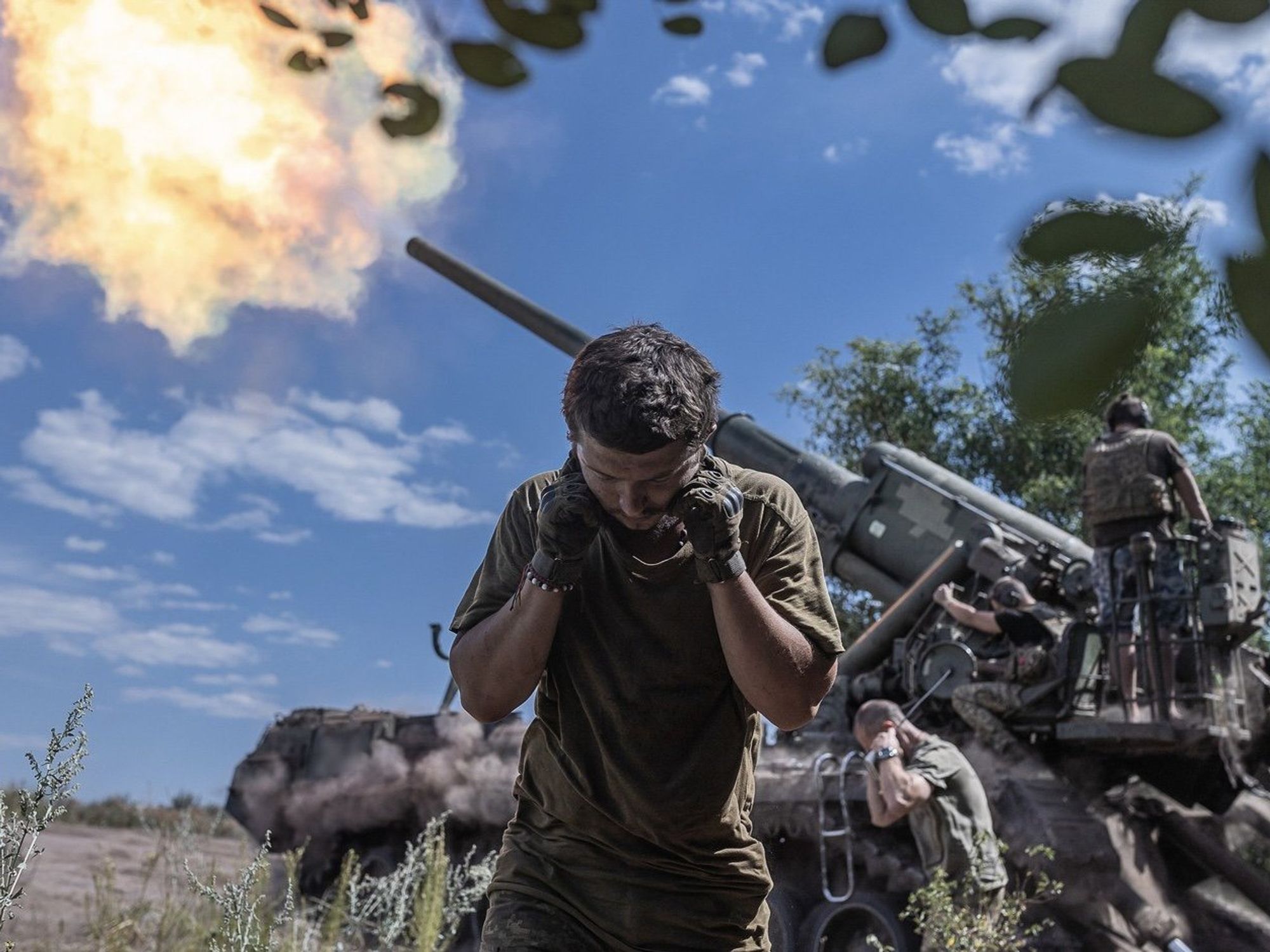 An image posted by Vladimir Zelensky of Ukrainian soldiers launching artillery at Russian positions.