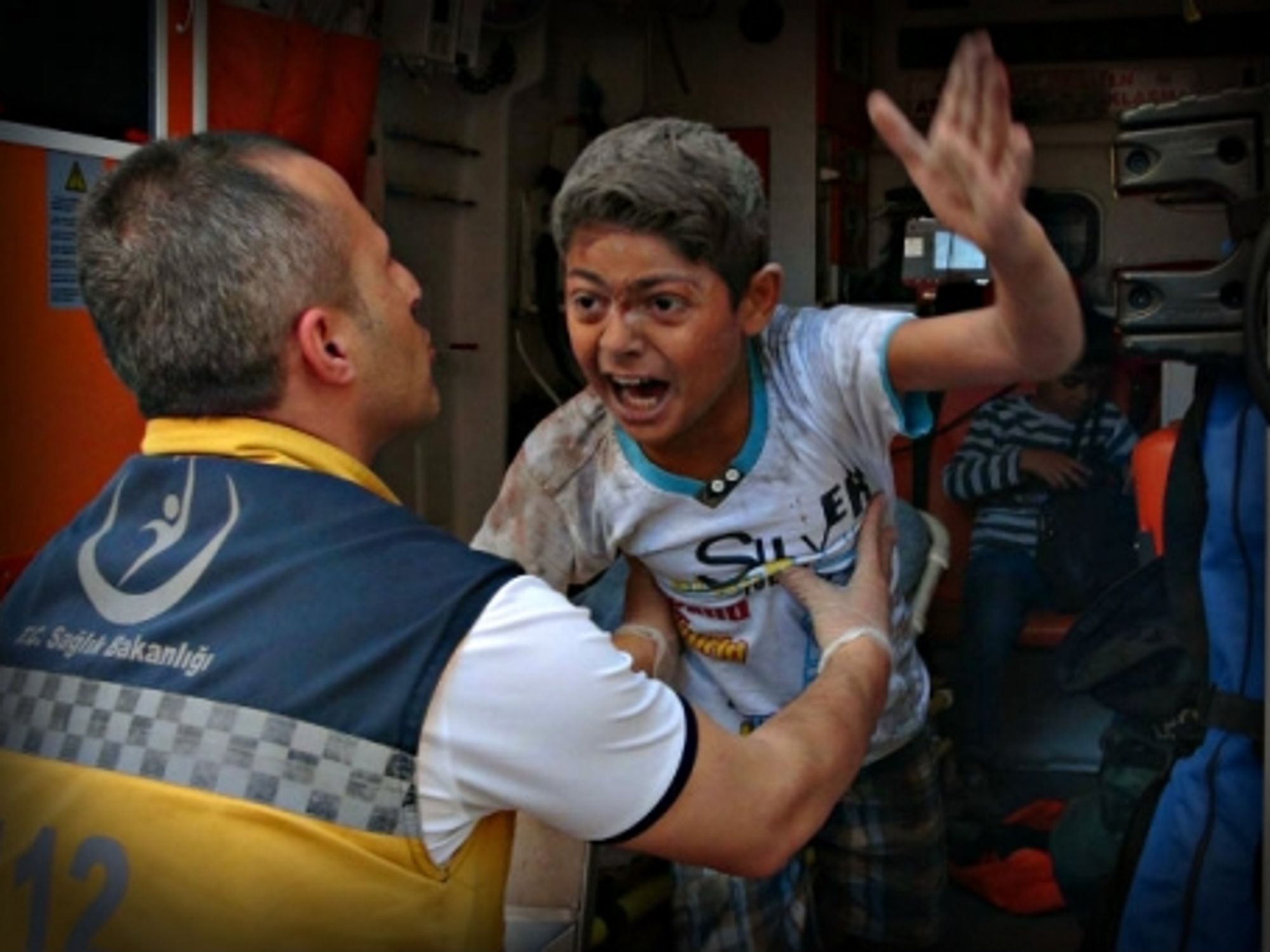 An injured boy after a missile launched from Syria struck Kilis, Turkey.