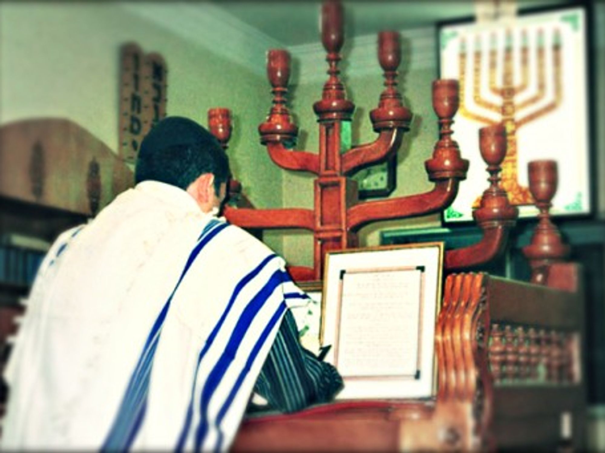 An Iranian Jew prays in a synagogue in Shiraz, Iran.