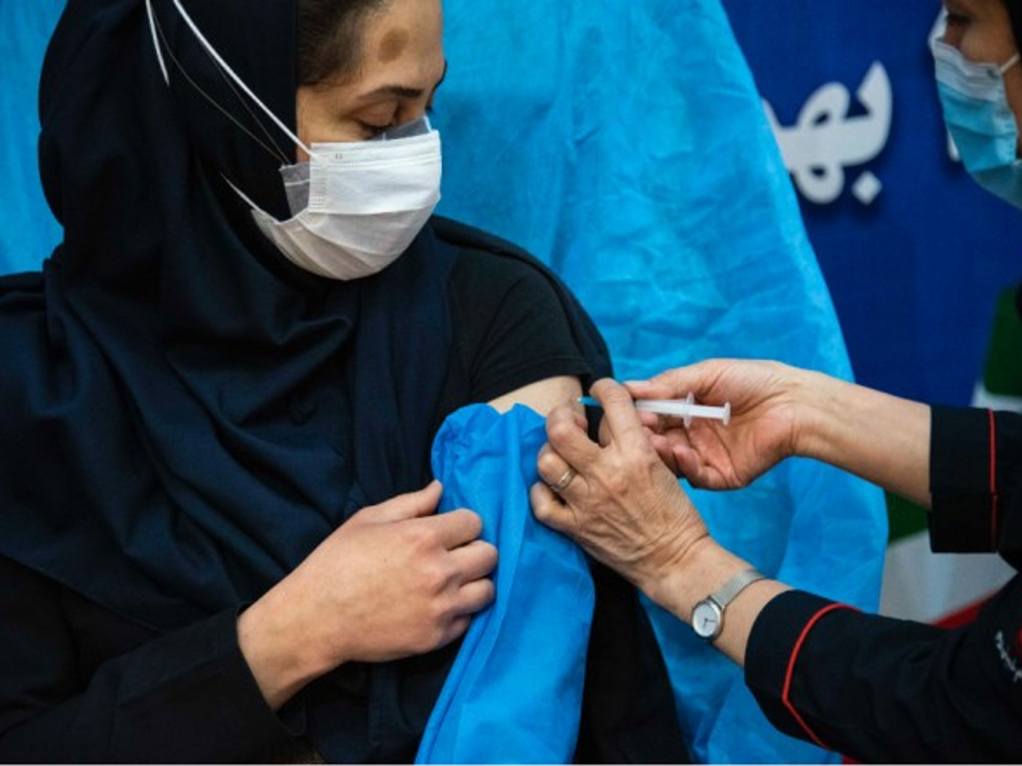 An Iranian nurse gets the Sputnik V Covid-19 vaccine in Tehran