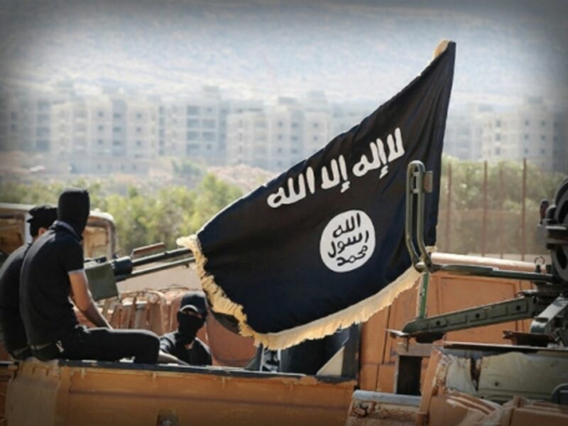 An ISIS-released propaganda photo shows troops overlooking Raqqa, Syria.