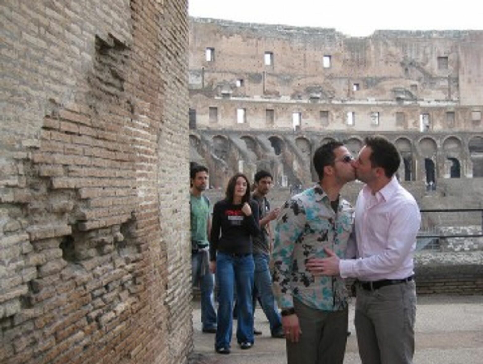 An Italian gay couple in the Colosseum in Rome