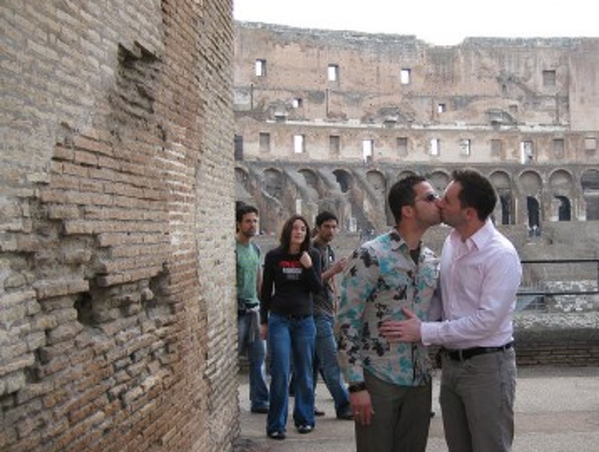 An Italian gay couple in the Colosseum in Rome